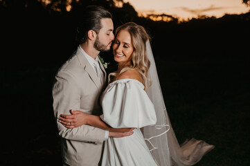 romantic couple in wedding outfit