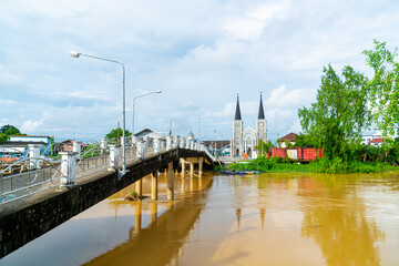 Cathedral of the Immaculate Conception with Niramon bridge at Chanthaburi in Thailand
