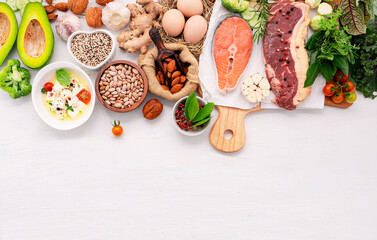 Ketogenic low carbs diet concept. Ingredients for healthy foods selection set up on white wooden background. - 582361608
