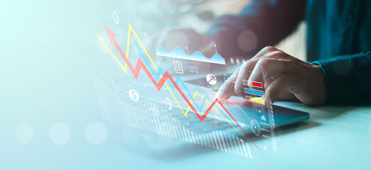 Businessman working on business analytics dashboard with KPI, charts, metrics to analyze data and...