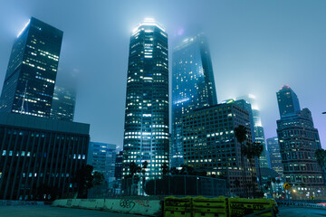 Downtown city buildings foggy night
