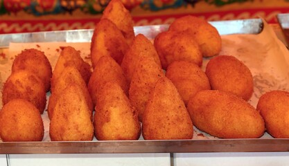 Arancini are a typical food from Southern Italy made with fried rice