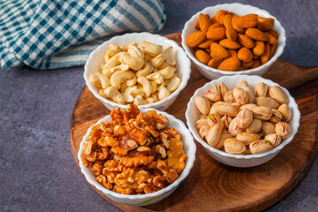 healthy food dry fruits almond, cashew,walnut,pistachios. selective focus.