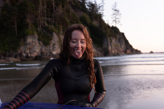 Surfer making funny face after surfing in Oregon
