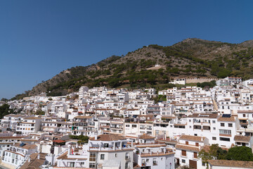Fototapeta na wymiar White Spanish pueblo blanco Mijas village Spain houses on hillside in the historic town in Andalusia