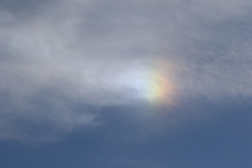 Iridescent clouds on a blue sky