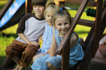 Children walk in the summer in nature. Child on a sunny spring morning in the park. Traveling with children.