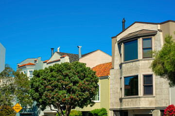 Fototapeta na wymiar Row of modern houses or townhomes in downtown city historic districts of suburban san francisco california