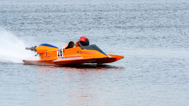 Minsk, Belarus - May 10, 2013: Close up view of bright hydroplane racing boat glides over the water surface