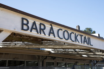 bar a cocktail french text on wall pub facade means wine alcohol cocktails bar france