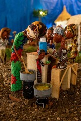 Representation of african village: cooking for the family