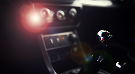 Manual gearbox. Car interior details. Car transmission. Soft lighting. Abstract view