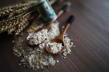 The concept of the cost of grain. 5000 ruble banknotes around a handful of ground grain. World hunger.