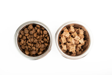 dry and wet pet food in bowls comparison, canned food and dry feed for dogs and cats isolated on white background