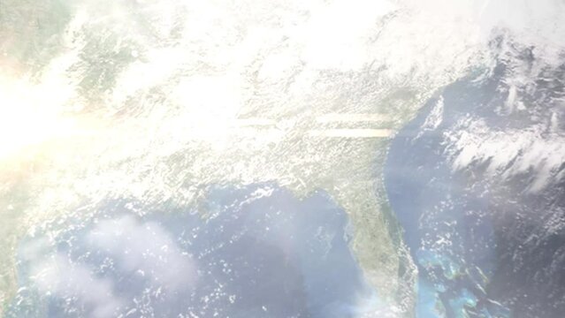 Earth zoom in from outer space to city. Zooming on Enterprise, Alabama, USA. The animation continues by zoom out through clouds and atmosphere into space. Images from NASA