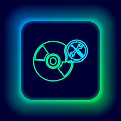 Glowing neon line CD or DVD disk with screwdriver and wrench icon isolated on black background. Adjusting, service, setting, maintenance, repair, fixing. Colorful outline concept. Vector