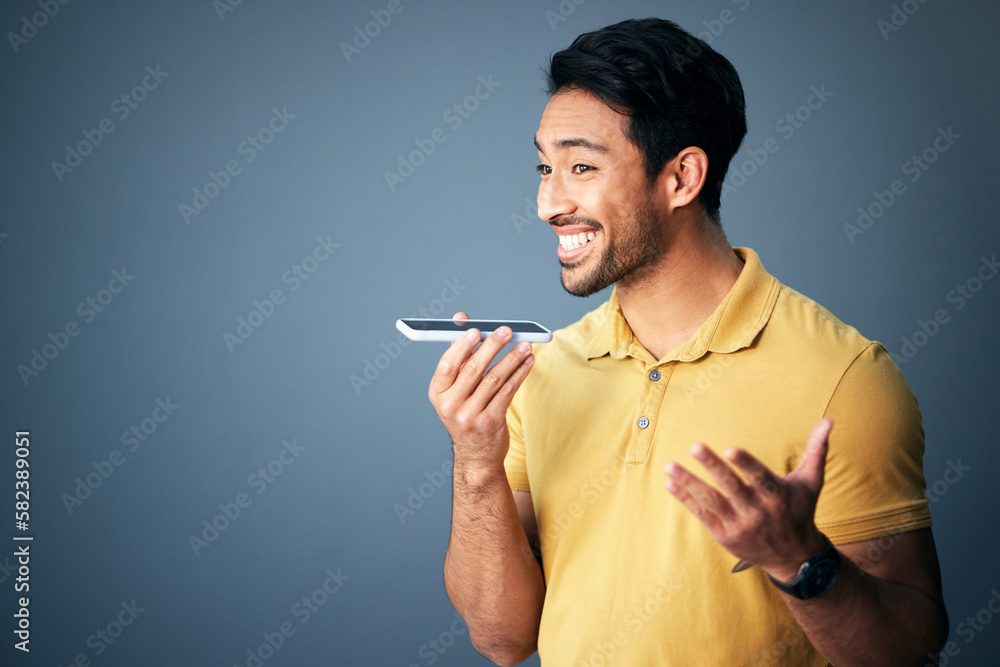 Poster Mockup, phone call and Asian man with speaker, conversation and connection against a studio background. Japan, male and guy with smartphone, talking and discussion with network signal and happiness