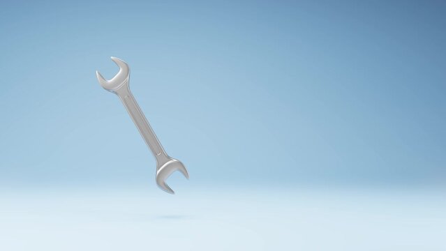 Metallic Wrench Spinning on a Studio Blue Background, Seamless Loop 3D Animation with Copy Space