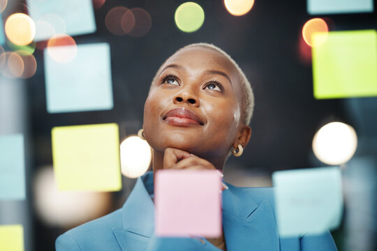 Thinking, vision and black woman with schedule, planning and agenda, sticky notes and bokeh background. Idea, face and female leader with goal, visual and problem solving, calendar and management