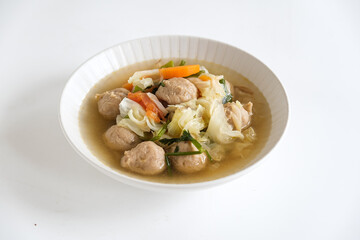 Meatball and vegetables soup in bowl