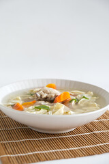 Chicken soup with beancurd and carrot