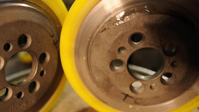 Loader drive wheels with polyurethane coating, after restoration
