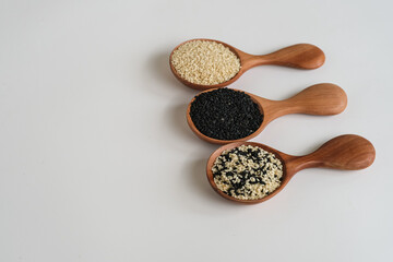 Sesame seed in wooden spoon