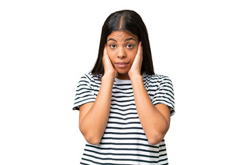 Young African american woman over isolated background frustrated and covering ears