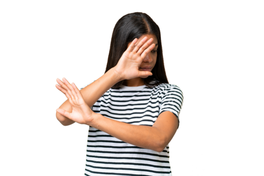 Young African american woman over isolated background nervous stretching hands to the front