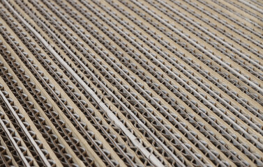 Cardboard cartons corrugated fiberboard paper boards for boxes. Packing concept macro photo