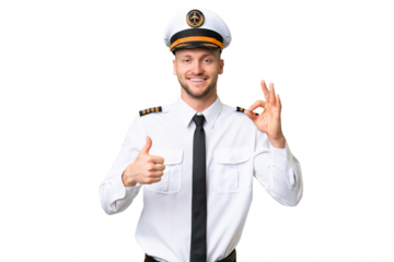 Airplane pilot man over isolated background showing ok sign and thumb up gesture