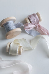 Pastel color of silk ribbon. Handmade. Fashion art material decoration on the table in wedding event.
