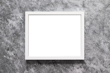 white rectangular picture frame mock-up with copy space for yout text or image on top of grey concrete background