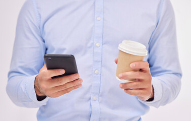 Phone, coffee and hands of business man in studio isolated on a white background. Cellphone, tea and male professional with smartphone for social media, web browsing or networking on mobile app.