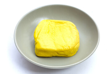 Yellow tofu on white background.