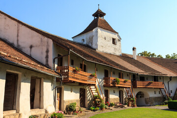 A view of the rooms in the protective walls of the historical Church-fortress in the city of Harman. Transylvania. Romania