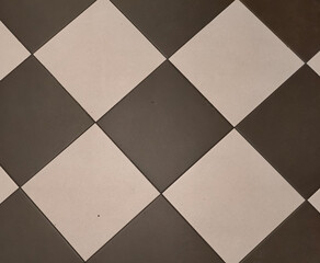 ceramic tile background with black and white rhombuses