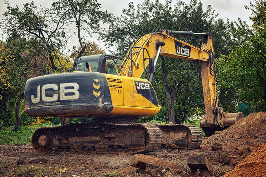 Minsk, Belarus. Sep 2022. JCB crawler excavator JS 220 SC at construction site. JCB industrial earthmover, excavation work. Earth moving heavy duty vehicle. Earthwork with heavy machinery