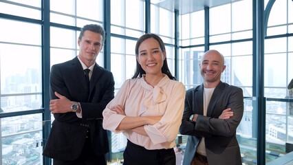 Team of professional diverse business people office workers smiling and standing with arms crossed looking at camera