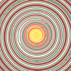 Vektorgrafik mit einem Wirbel in den Farben grün, rot und gelb.