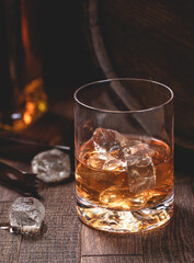 Glass of whiskey with ice