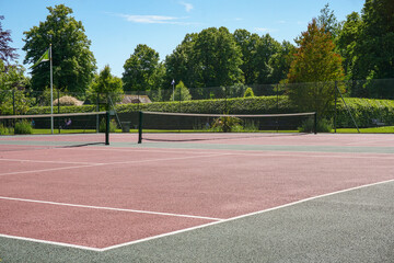 tennis court with net in public park. Leisure and recreation facilities 