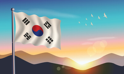  South Korea flag with mountains and morning sun in background