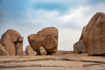 Beautiful view of boulder strewn landcape and ruins Hampi