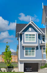 New residential townhouse on bright sunny day
