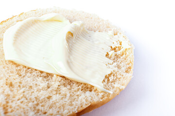 bun with melted cheese on a white background