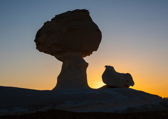 Fototapeta na wymiar Barren desert landscape in hot climate with rock formation