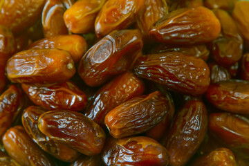 Dates. Dried date palm fruits. Healthy sweet snack food Pile of tasty dry dattes. Date harvest symbolizing Ramadan.