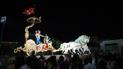 krishna sitting on a chariot beautiful statue distant view