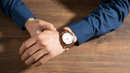 Businessman with a luxury wristwatch. Fashion, Lifestyle